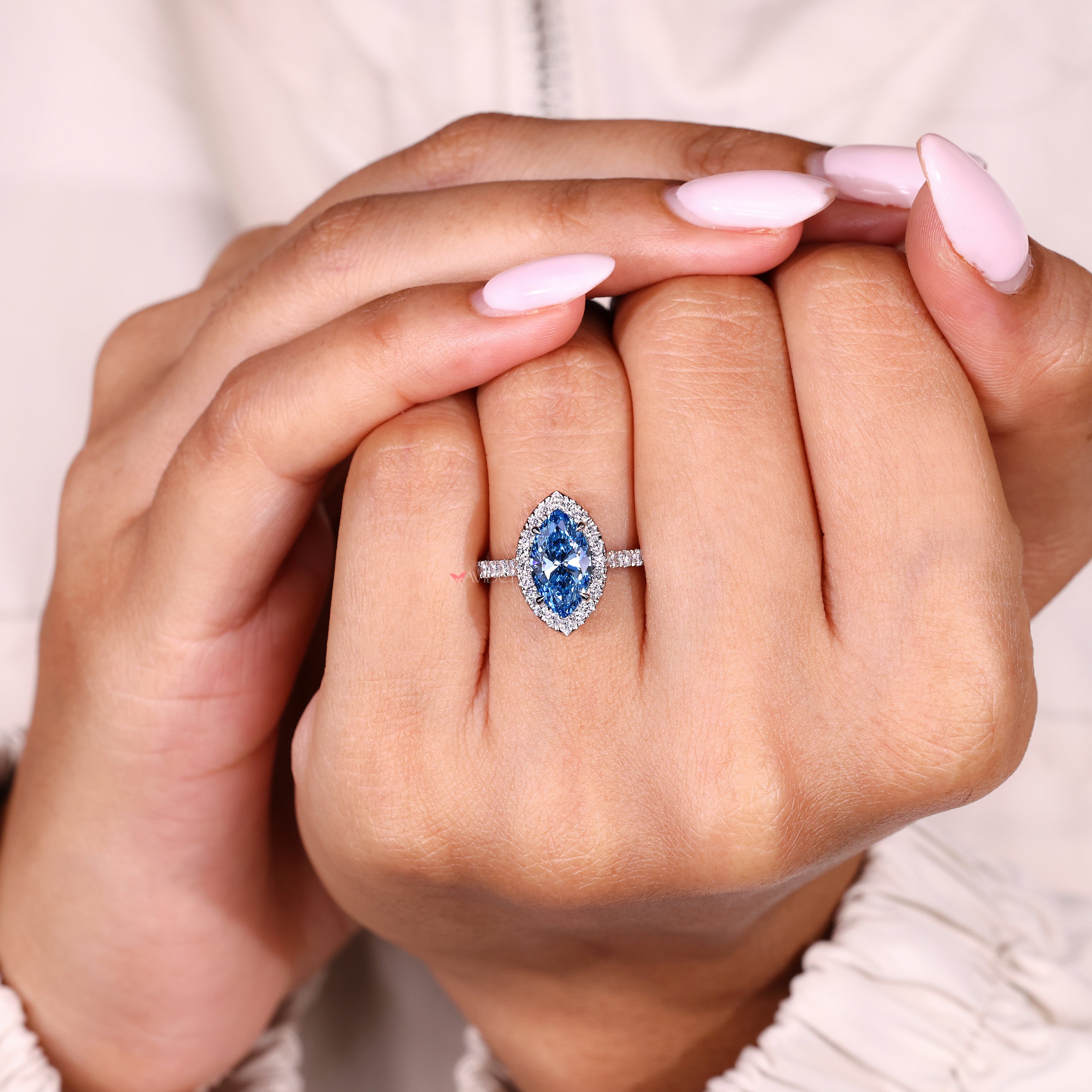 IGI certified marquise ring with claw prong setting design

