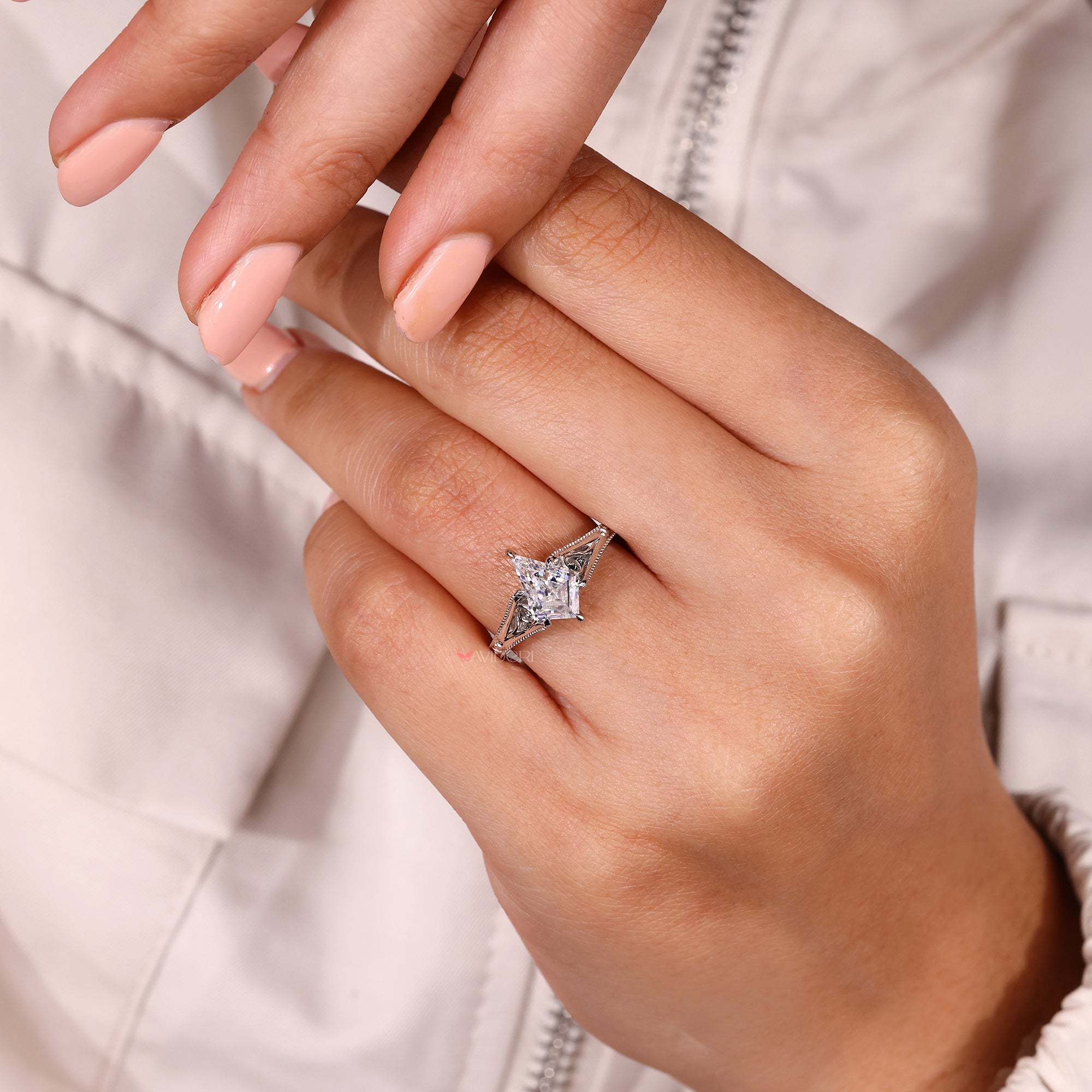 Milgrain setting six claw prong engagement ring.
