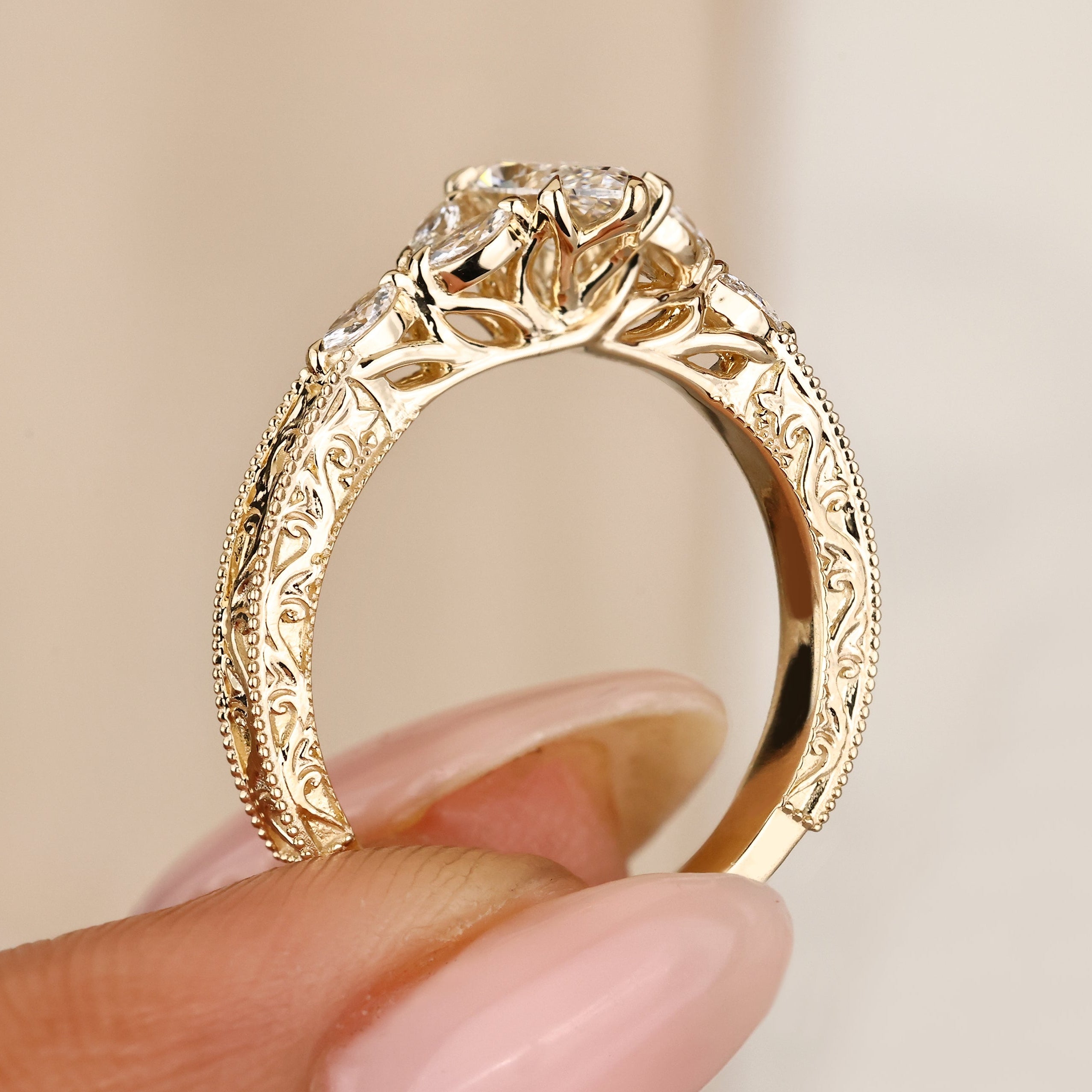 Marquise engagement ring with small side stones.
