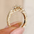 Marquise engagement ring with small side stones.
