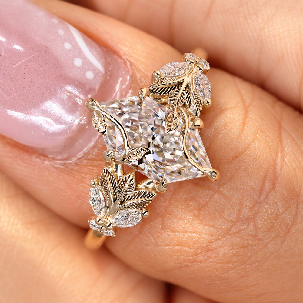 Marquise diamond ring with leaf style basket setting.
