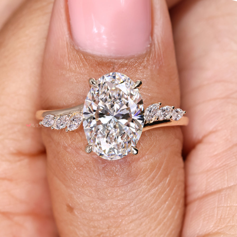 Handmade oval diamond ring with round hidden halo accents
