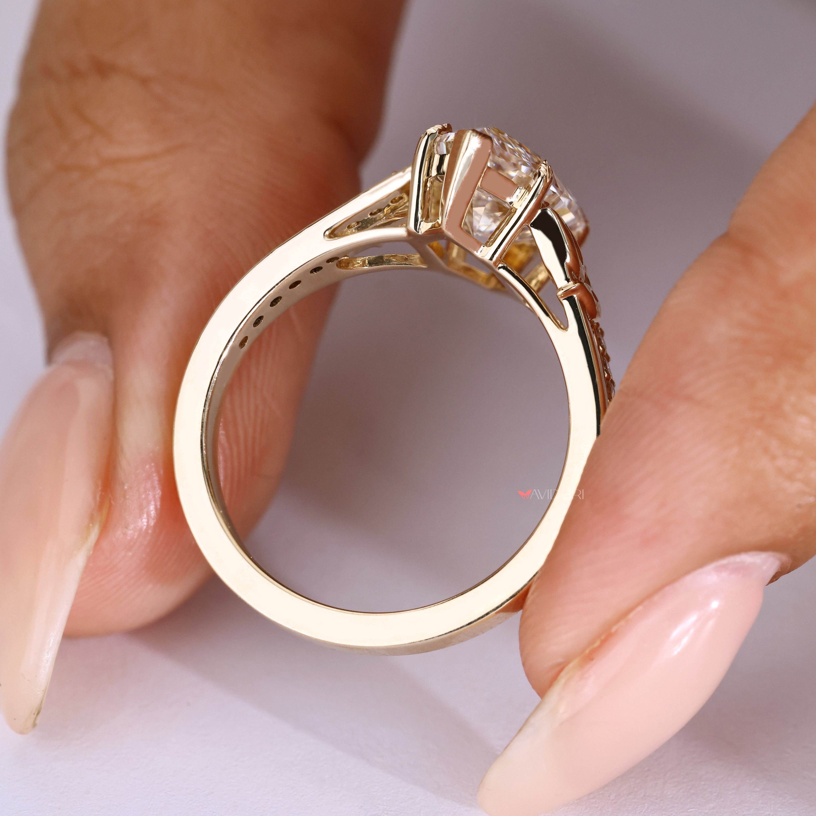 Handmade marquise ring with split shank pave.
