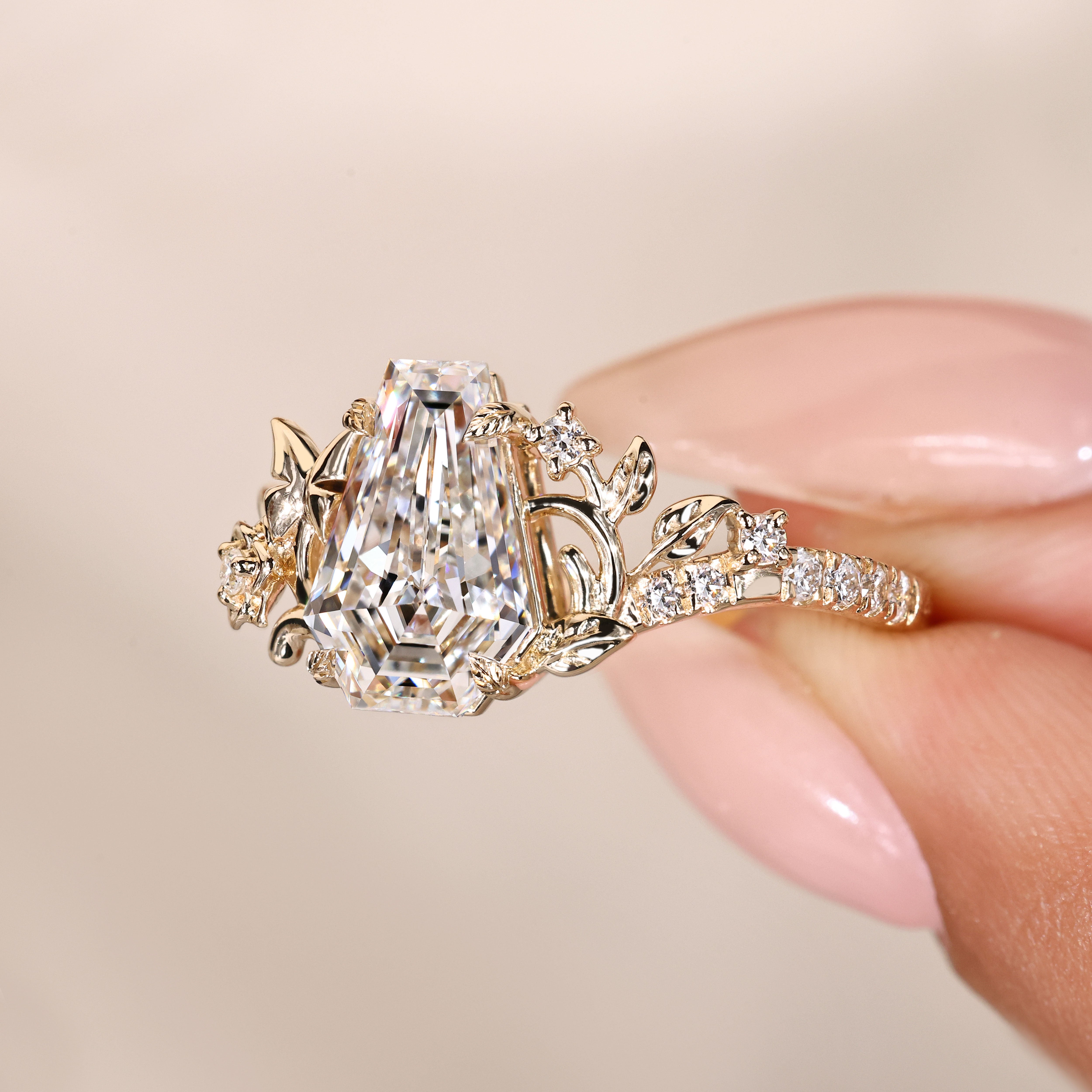 Lab grown coffin diamond ring with butterfly detail.
