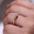 Milgrain setting adds texture to the engagement ring.