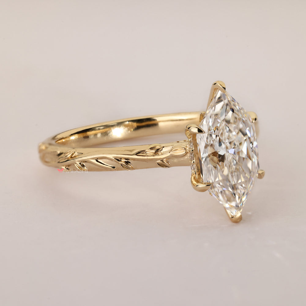 Handmade Dutch marquise diamond ring with halo.
