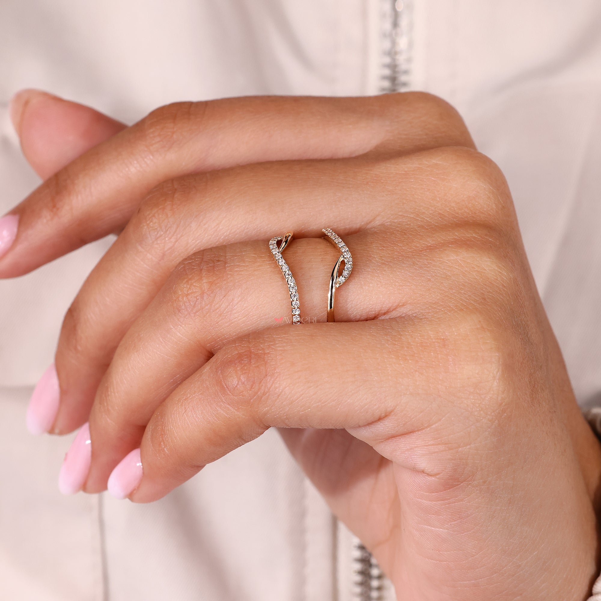 Unique wedding band designed as a ring enhancer.