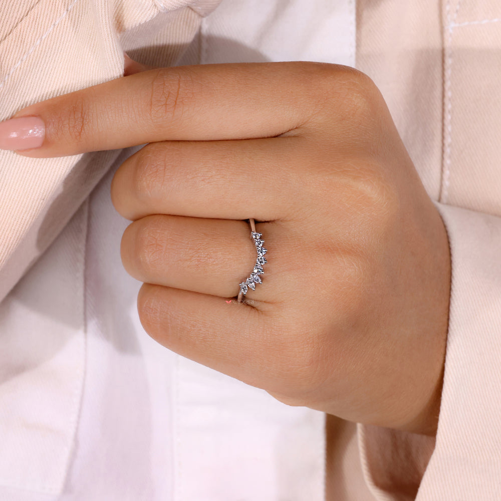 Tiara wedding band with sparkling diamonds on the crown.

