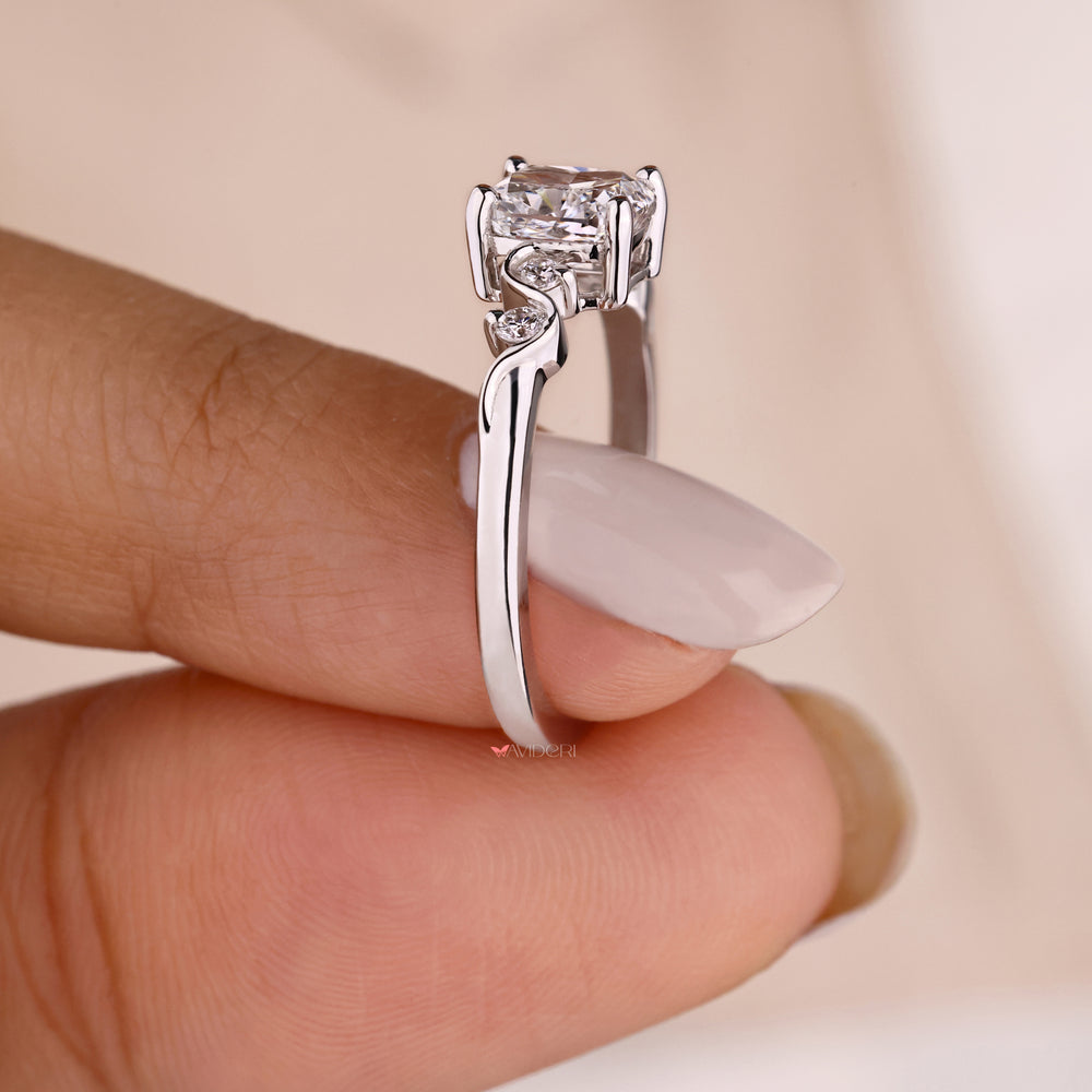 Gold engagement ring with a handmade ring setting.
