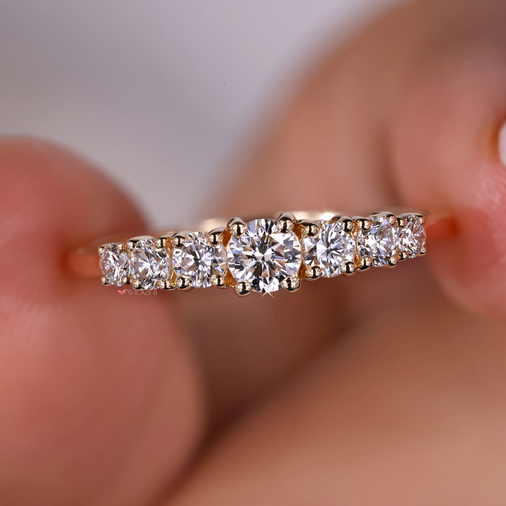 Half eternity wedding band with round diamonds

