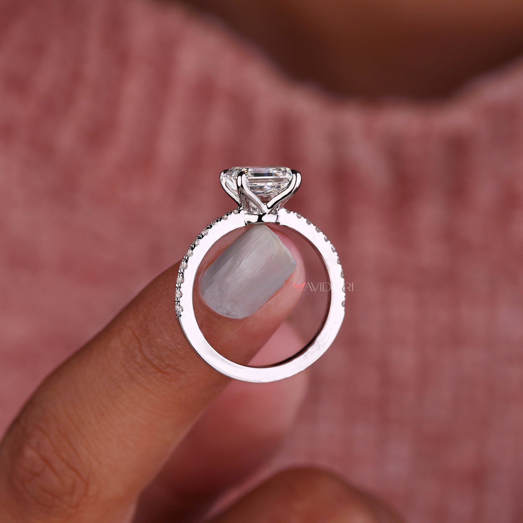 Asscher diamond engagement ring with a 4 prong round engagement ring design for a modern yet classic look.
