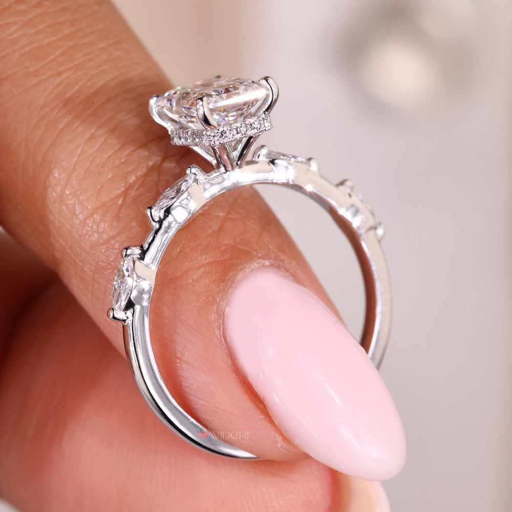 White gold ring with a radiant cut lab-grown center for elegance.
