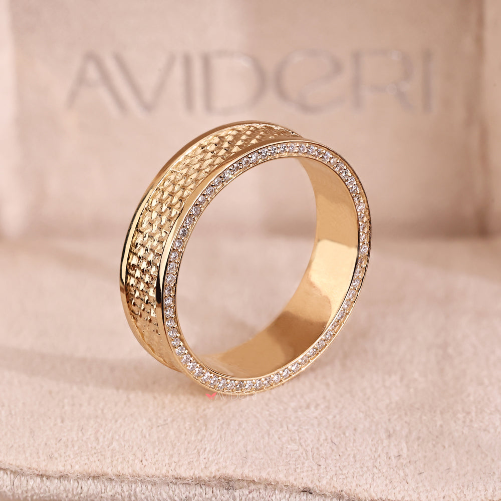 Double sided eternity band shows diamonds all around in yellow gold.