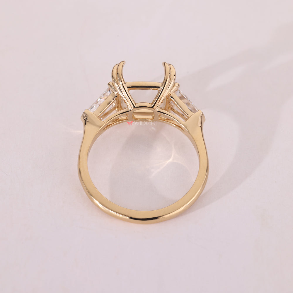 Avideri engagement ring with bullet cut accents.
