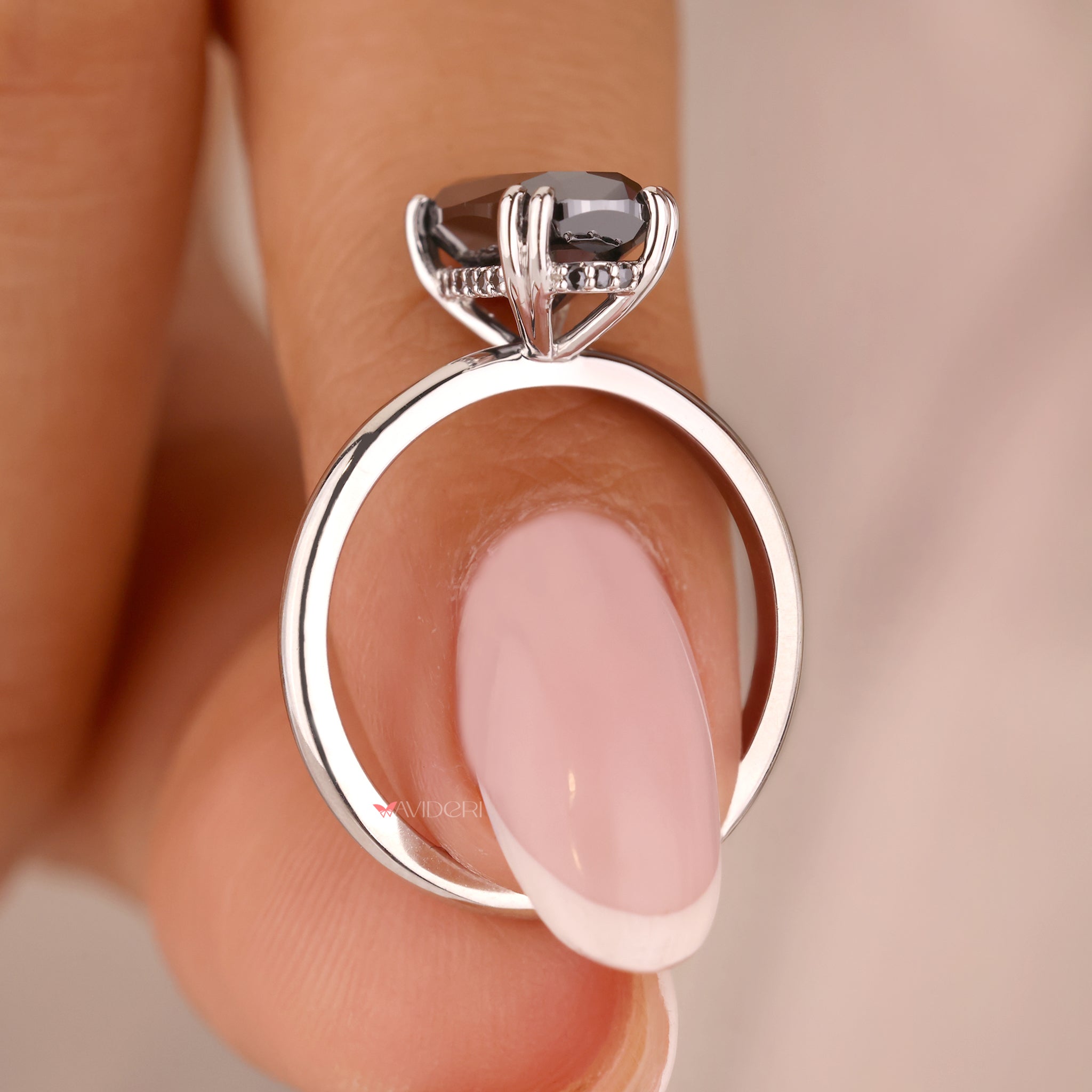 White gold engagement ring glows with soft and elegant shine.

