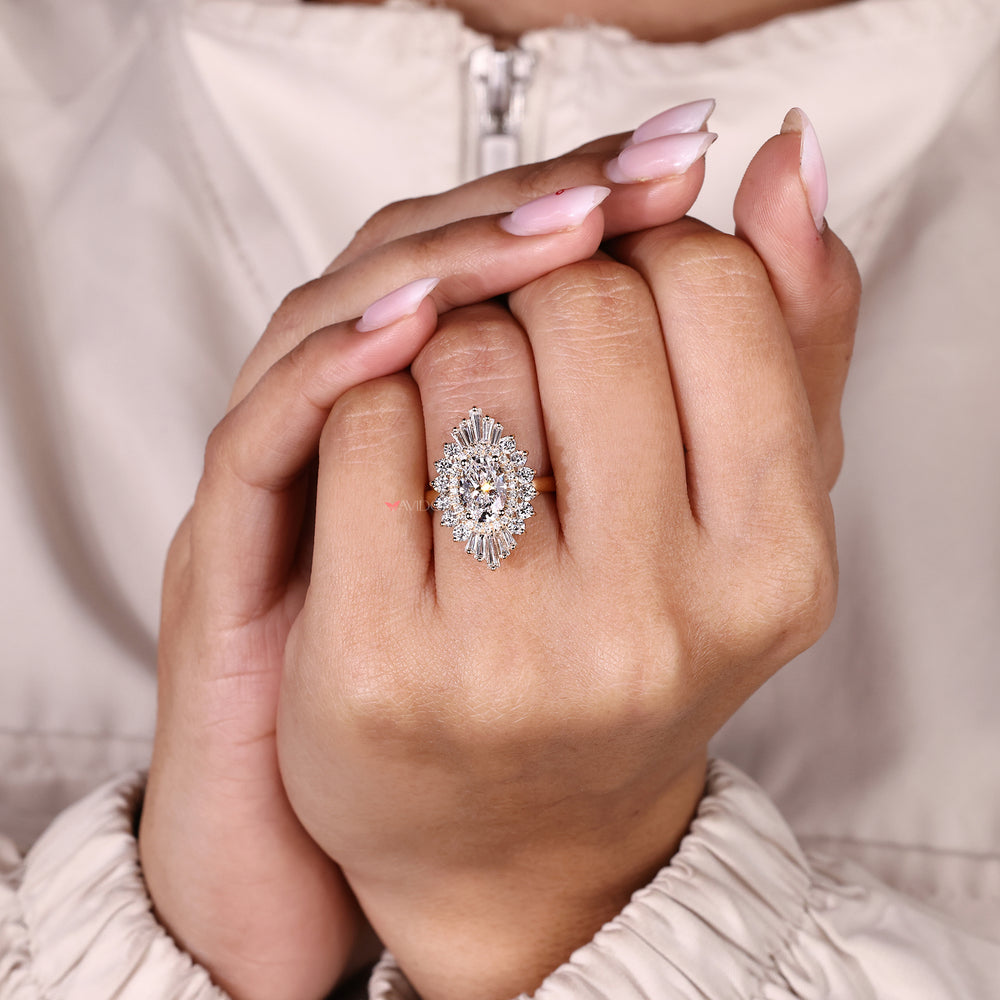 Double halo oval diamond ring in snowflake style.