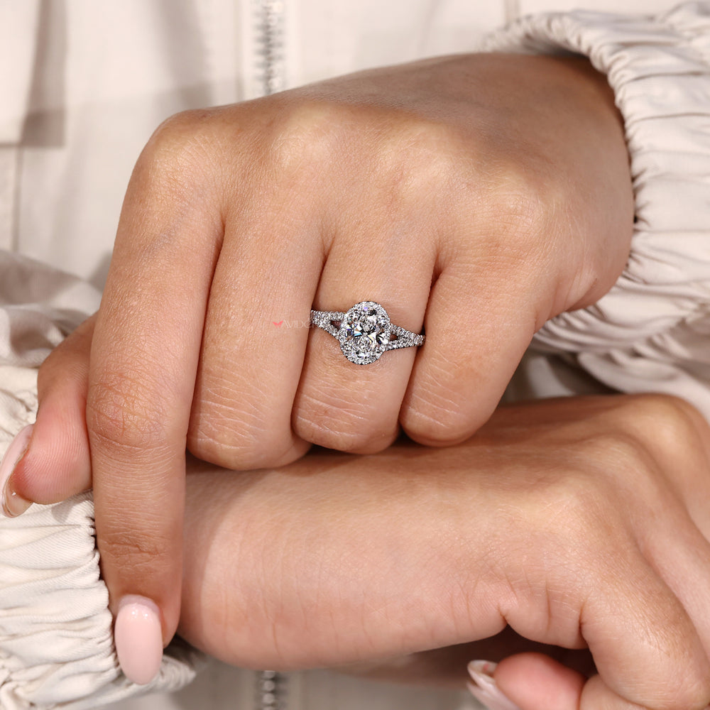 Halo diamond ring featuring an Oval diamond ring for added brilliance.
