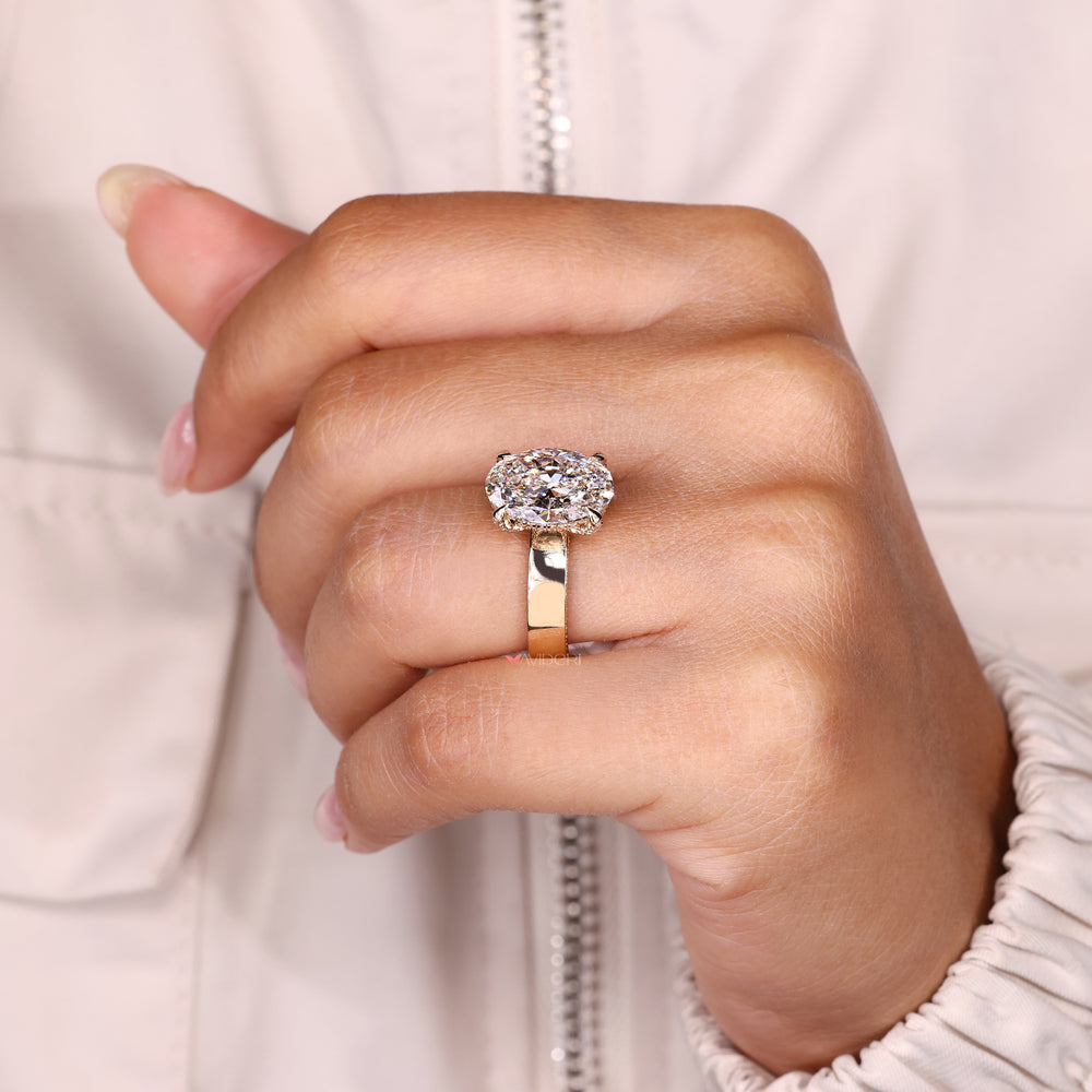 Oval ring with hidden accent and pave design.
