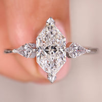 Dutch Marquise Ring With Kite Cut Side Stone