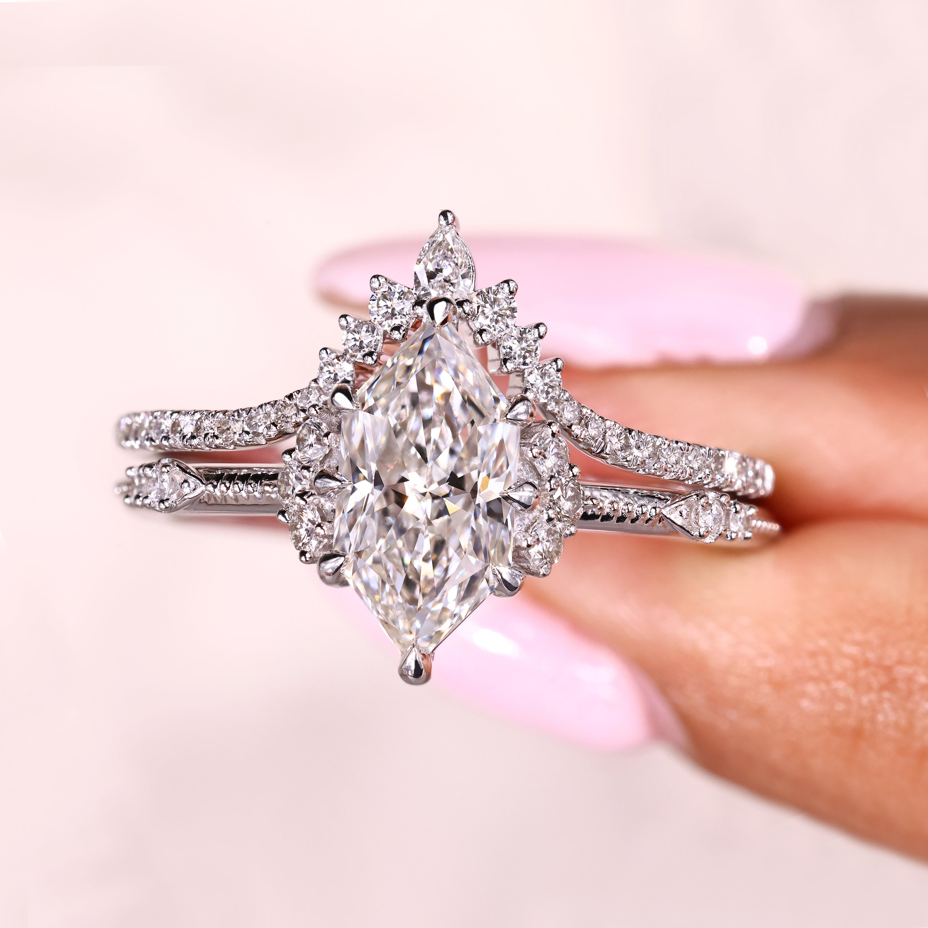 Lab grown diamond bridal set with pear and round stones

