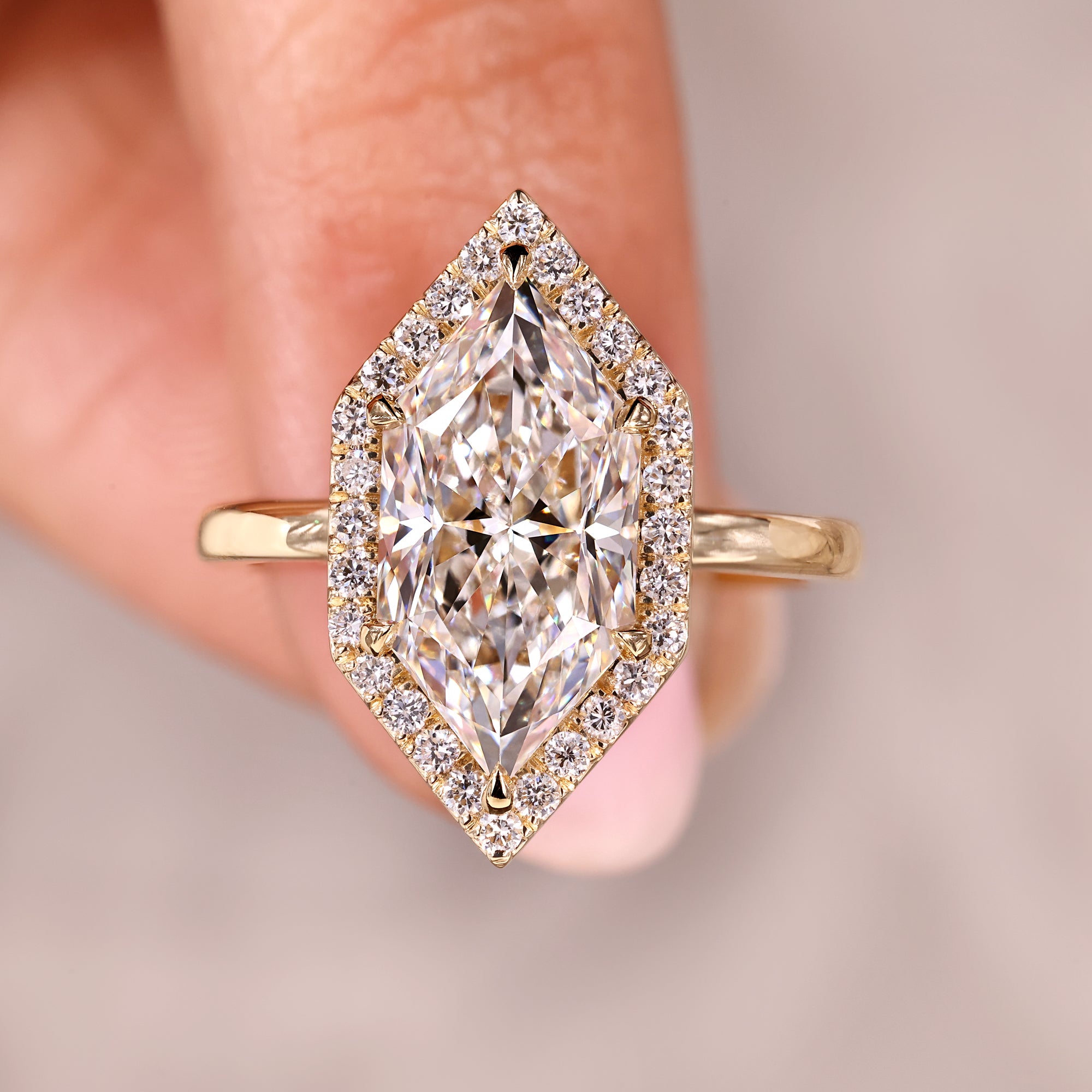 Halo engagement ring with handmade jewelry.