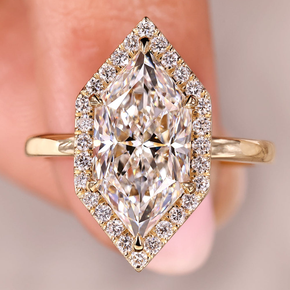 Halo engagement ring with handmade jewelry.