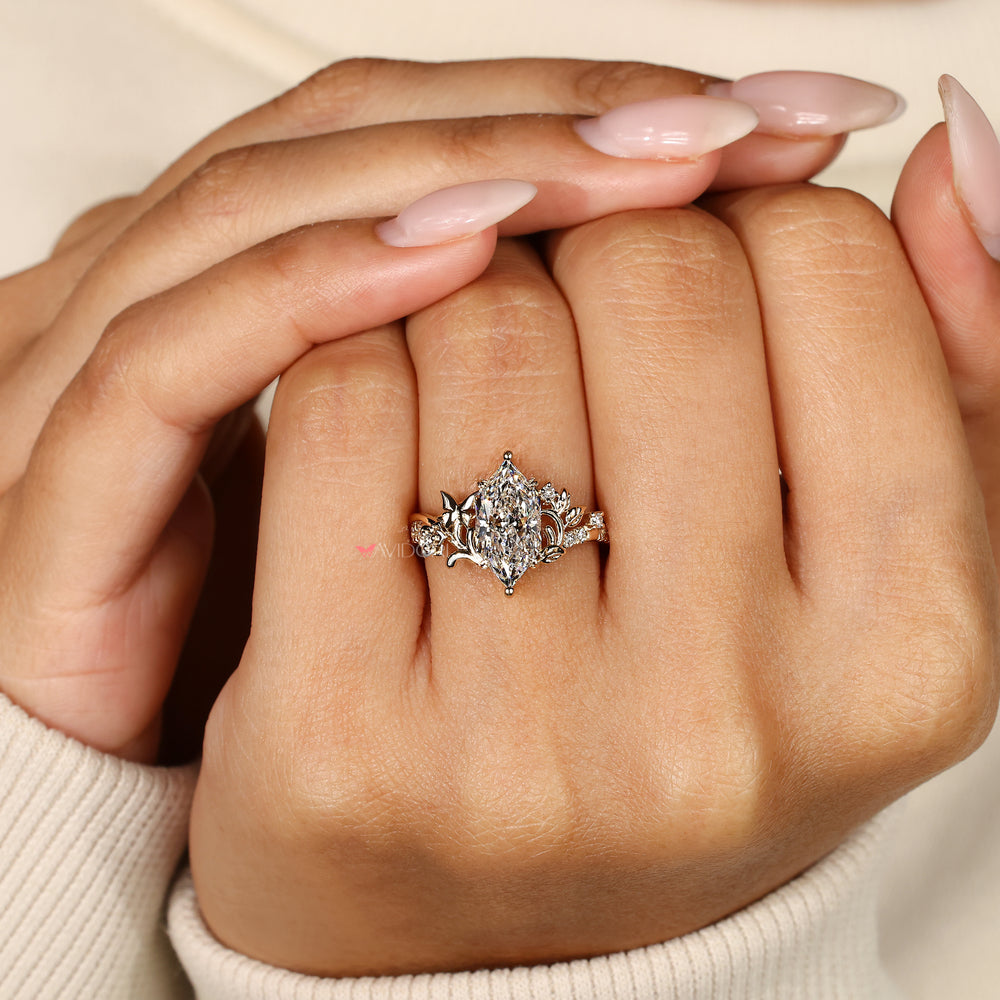 Lab grown Dutch marquise diamond ring with pave.
