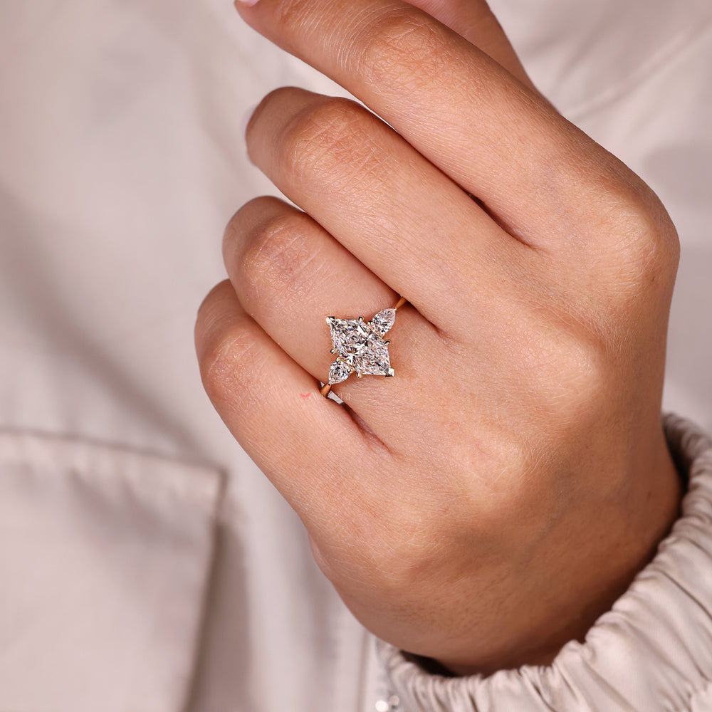 Dutch marquise ring with four claw prongs.
