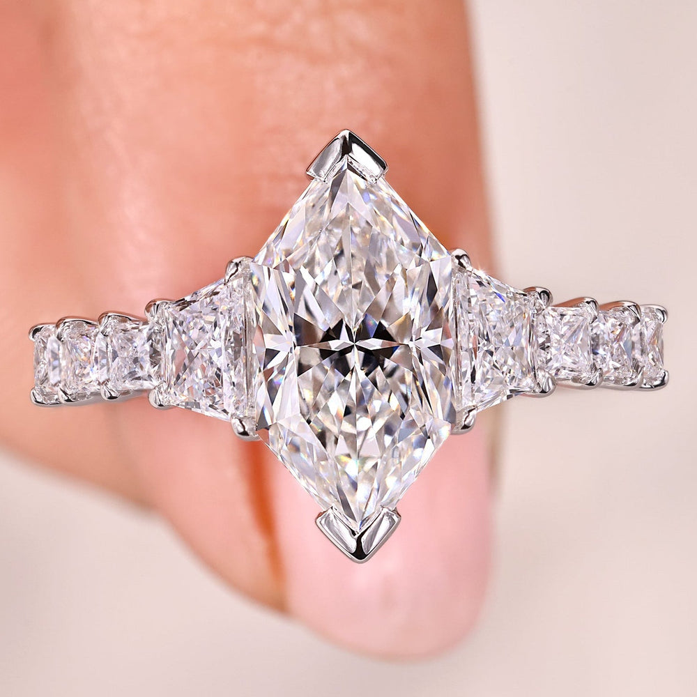 Dutch marquise ring with trapezoid side stone.