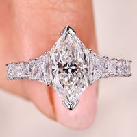 Dutch Marquise Ring With Trapezoid And Princess Side Stone