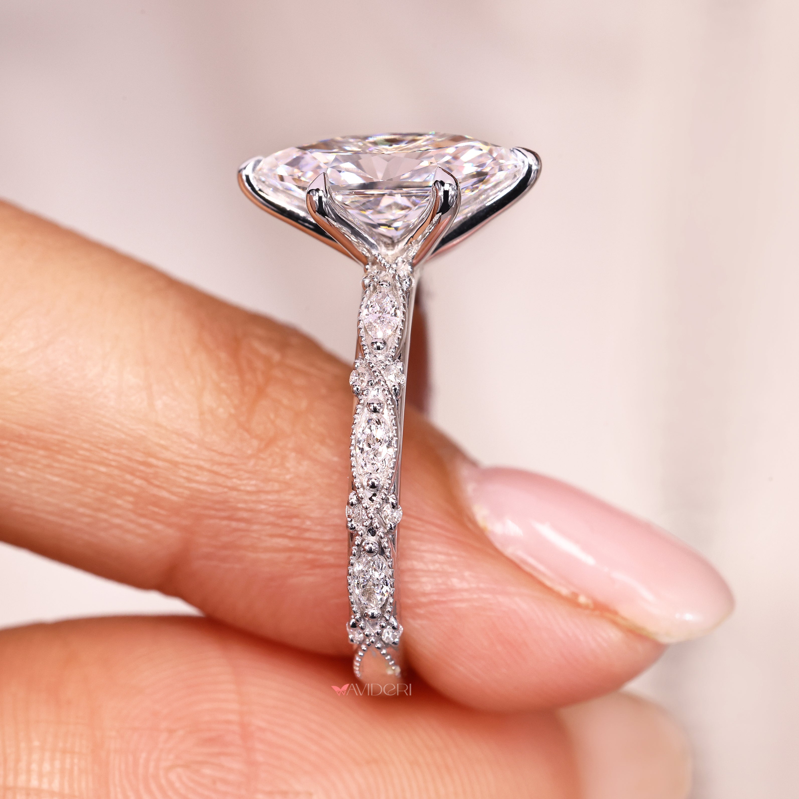 IGI certified dutch marquise diamond ring with claw prongs.
