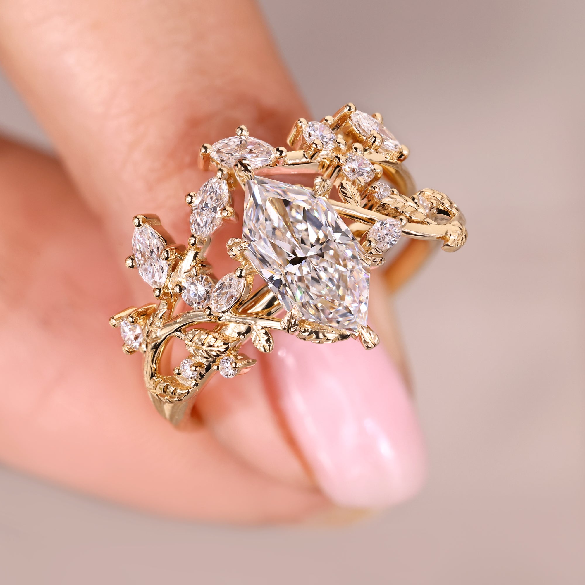 Cluster style ring with marquise and round diamonds.