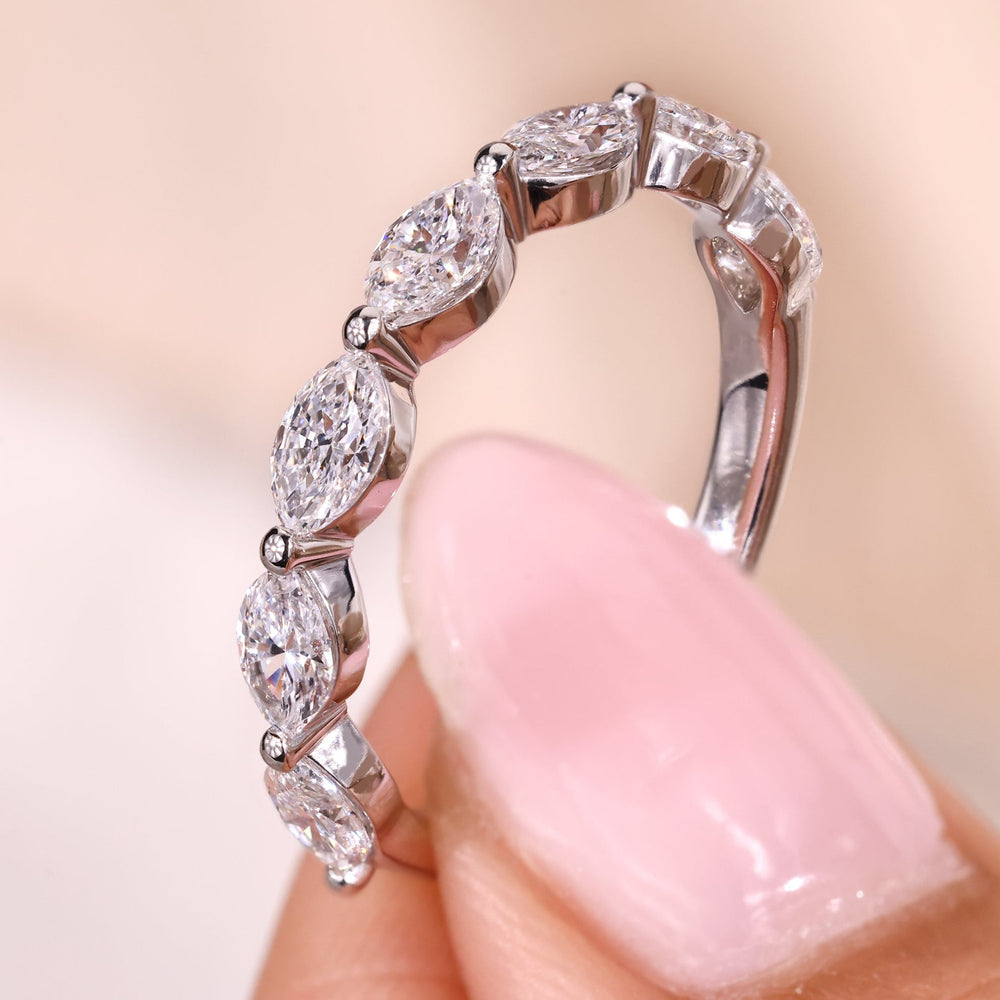 Marquise diamond wedding band with shared prong wedding band.