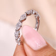 Marquise diamond wedding band with shared prong wedding band.