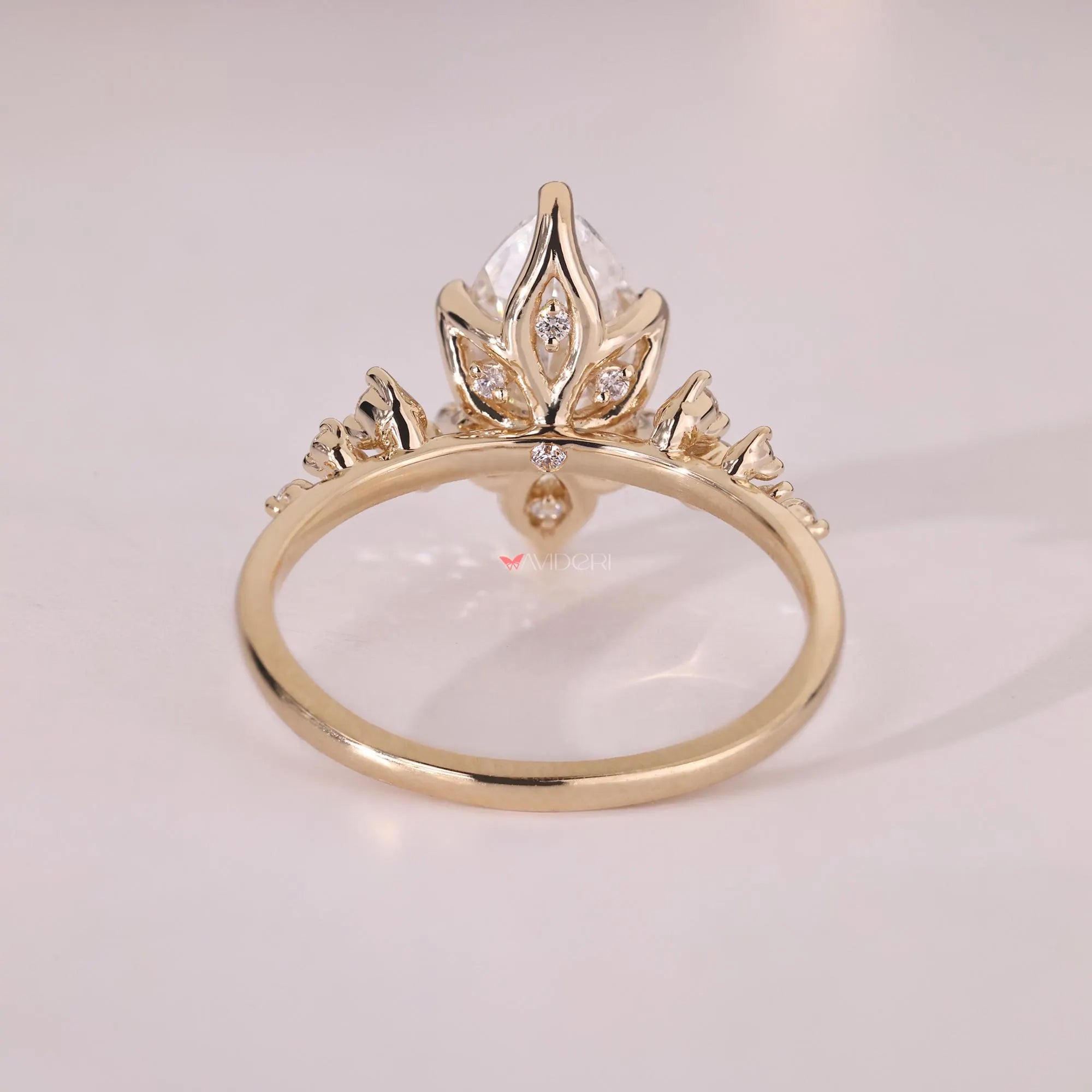Hidden birthstone ring with a round diamond center, designed for a personalized touch.