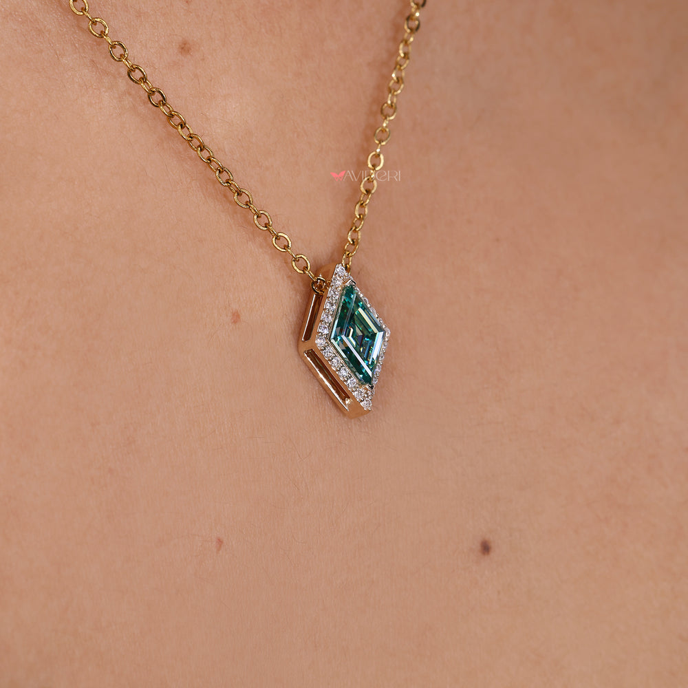 Lozenge cut pendant with sparkling halo.
