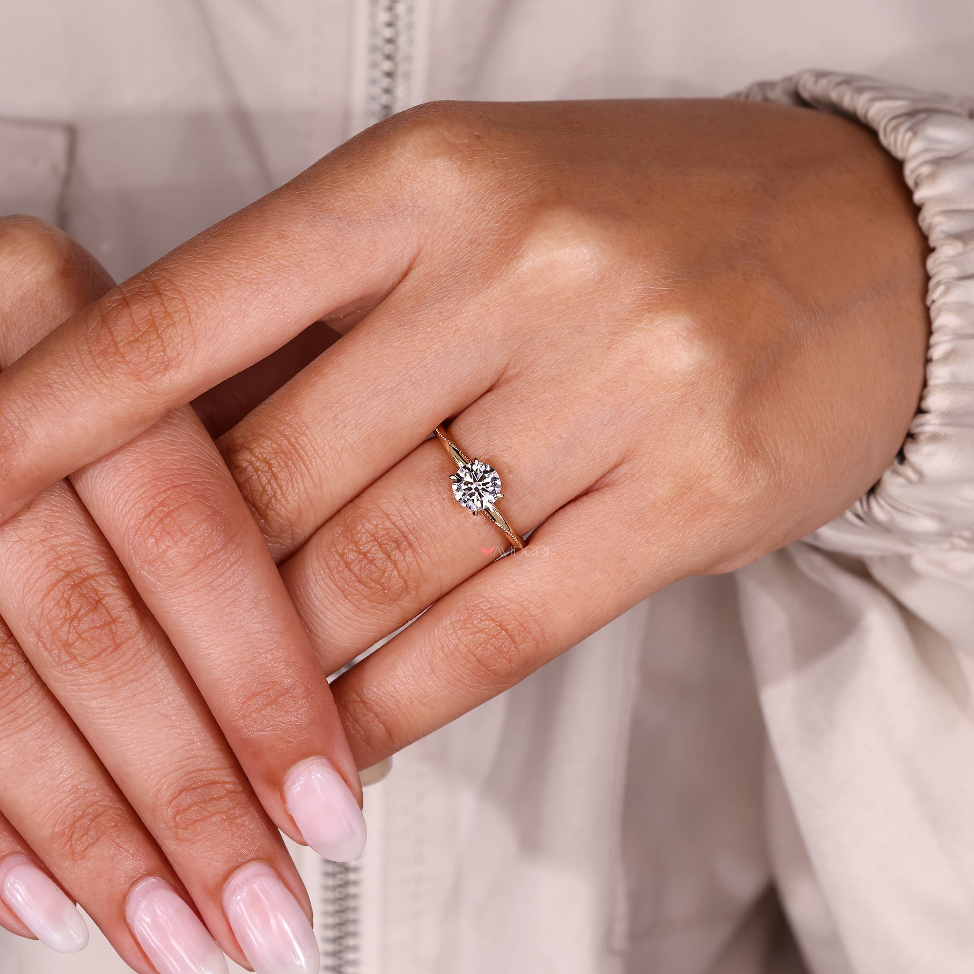 Round cut diamond solitaire ring with timeless appeal.

