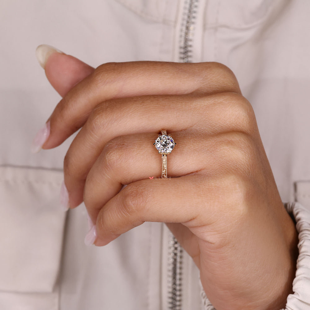 Six claw prong old European diamond ring.
