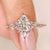 Marquise cut diamond ring with kite side stones.
