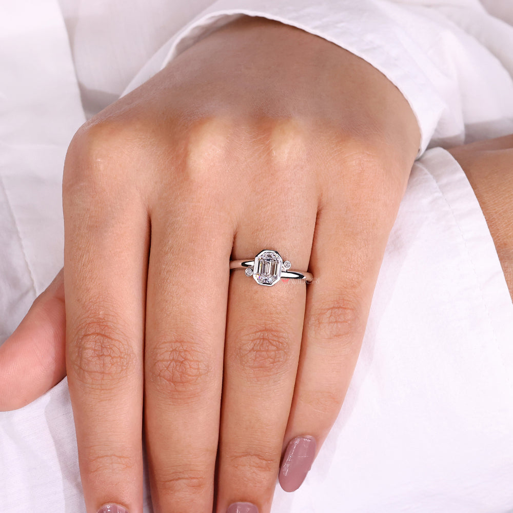 Sophisticated emerald cut engagement ring for modern elegance.
