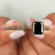 Emerald cut moissanite ring with an emerald cut engagement ring setting.