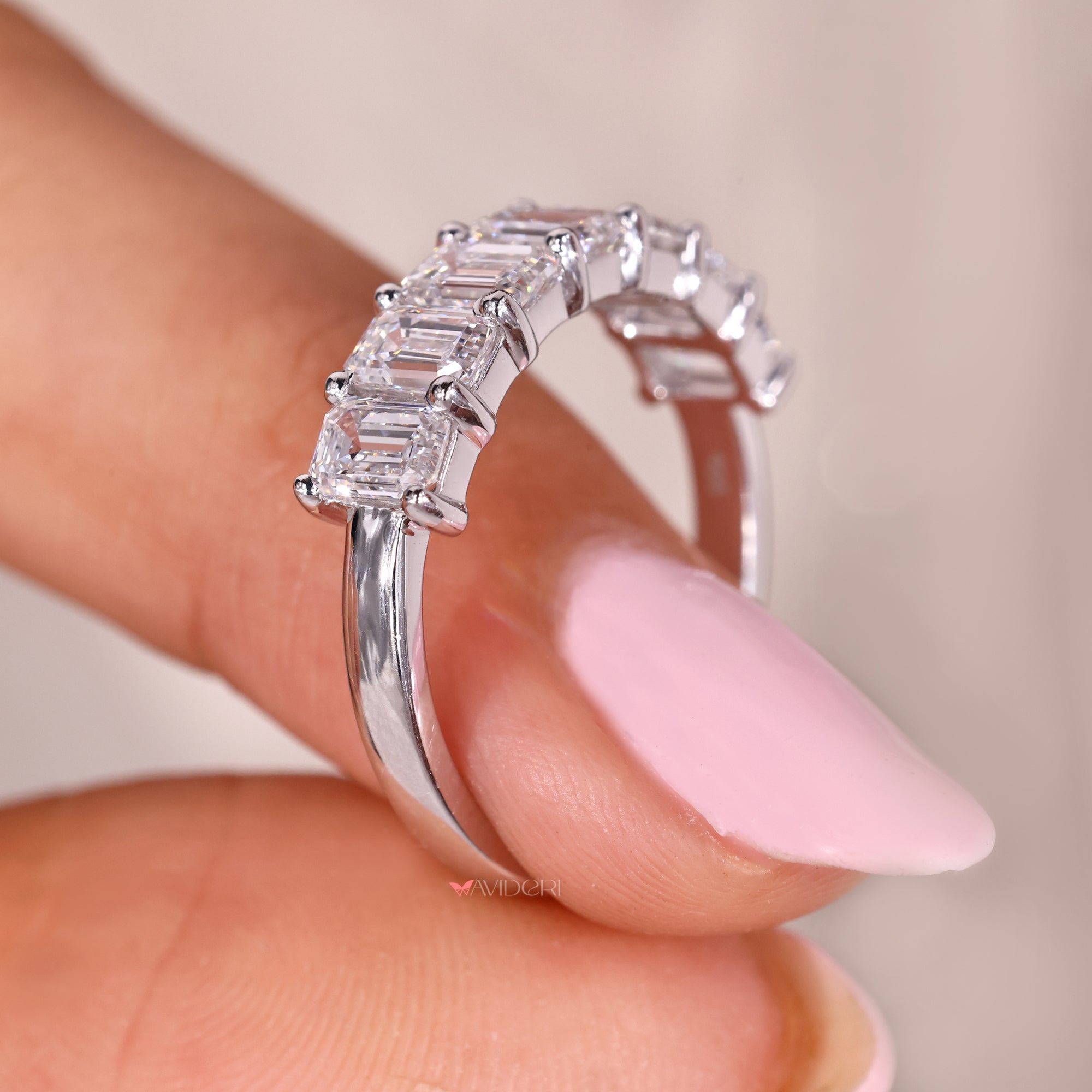 White gold wedding band in emerald cut wedding band.
