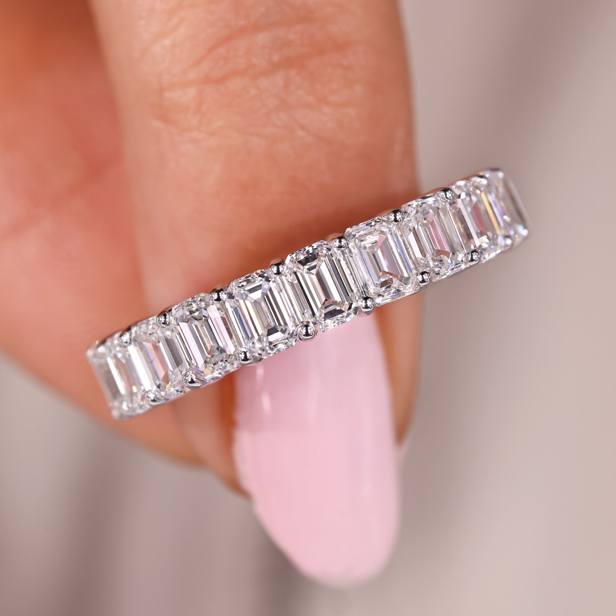 Emerald cut diamond wedding band with full eternity band.