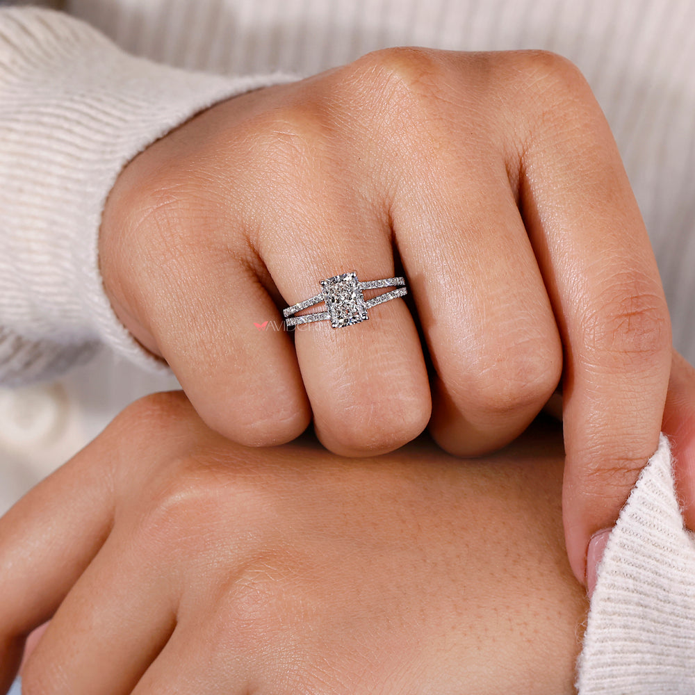 Round brilliant cut diamond in a halo ring for an elegant finish.
