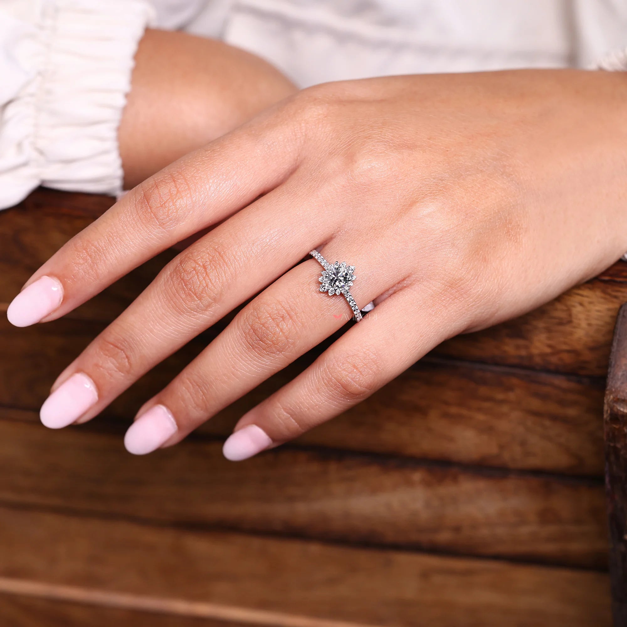 Pave setting ring with cathedral engagement ring.