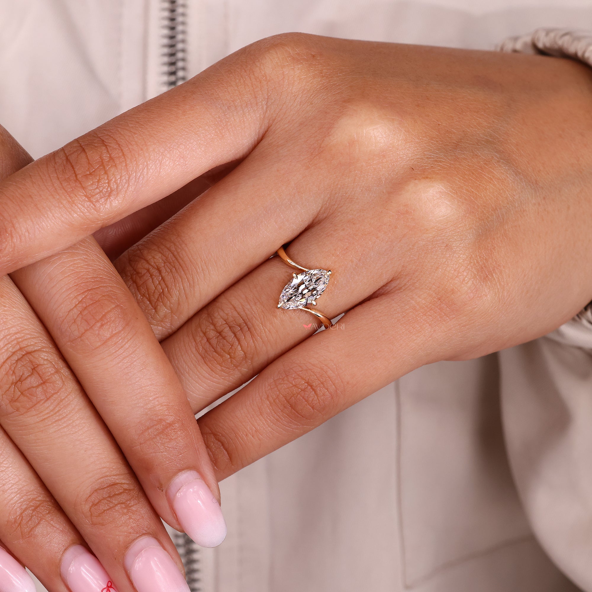 Handmade marquise solitaire diamond ring design.