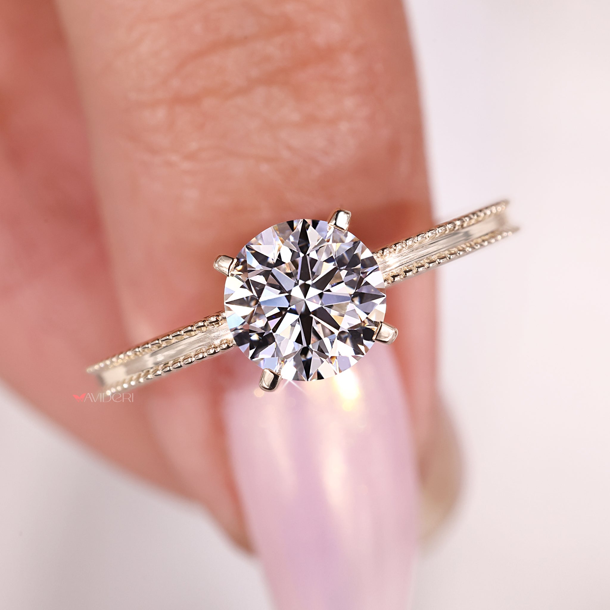 4 tab prong holds the Lab Grown Diamond securely.