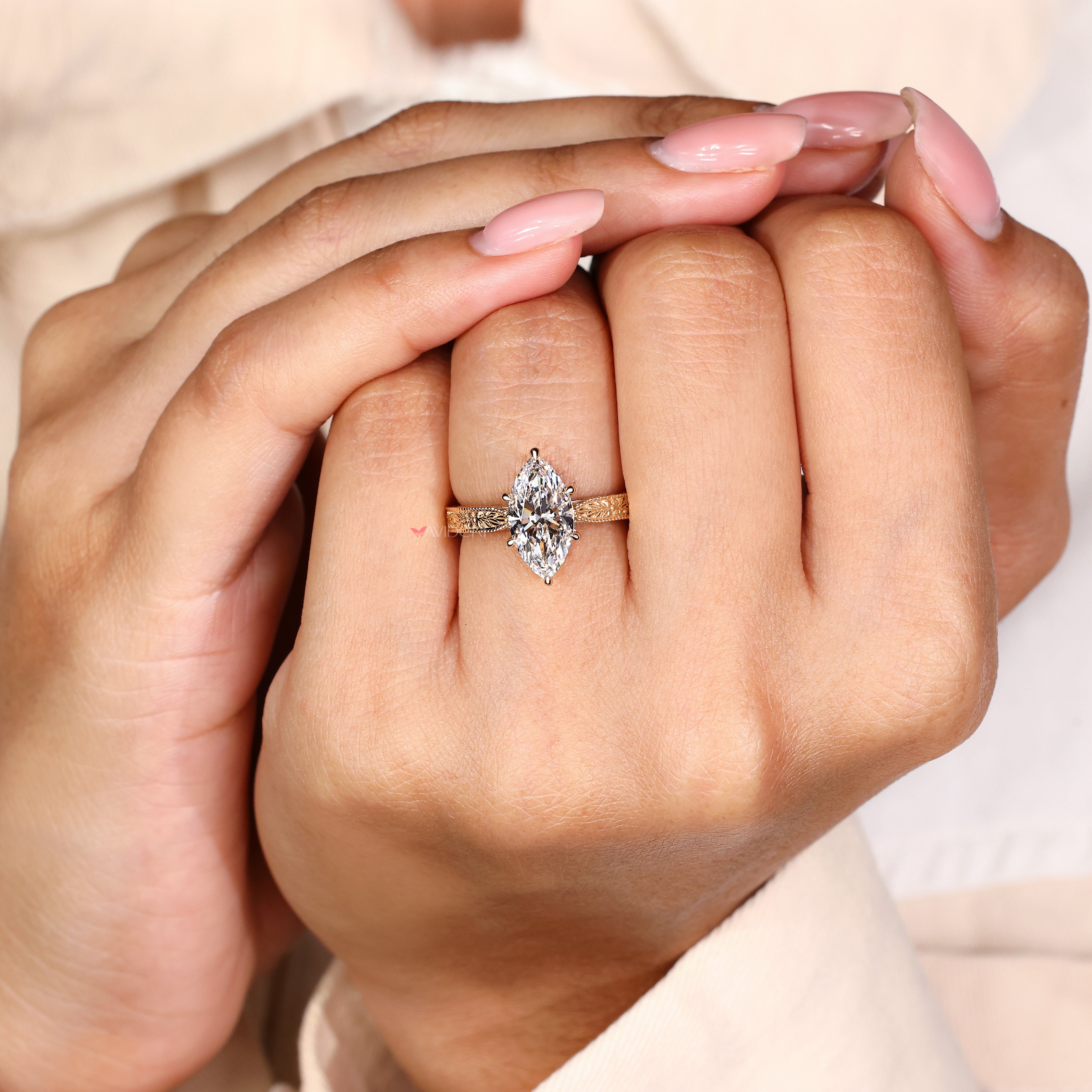 Lab grown marquise diamond ring with nature inspired design
