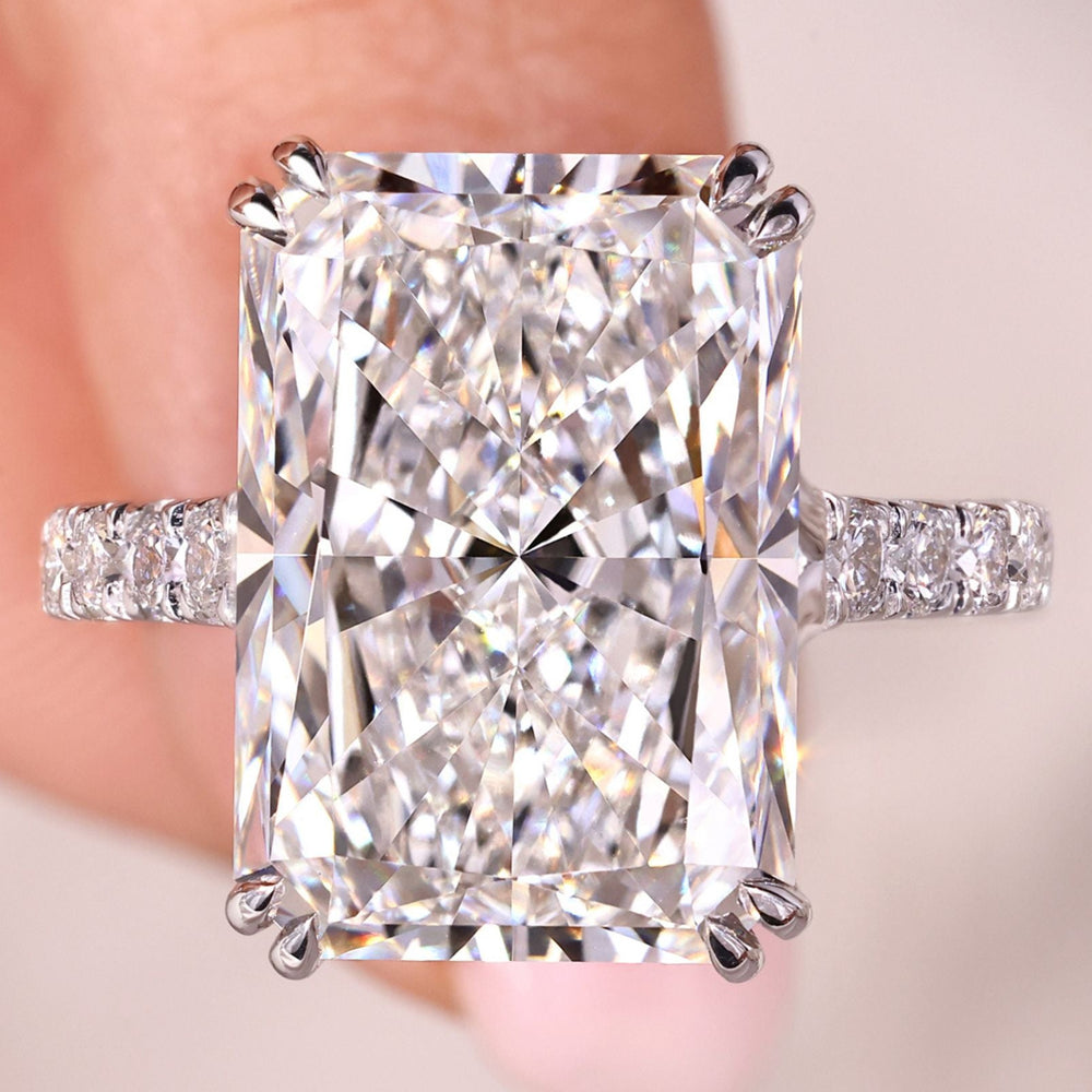 Radiant cut engagement ring in white gold.