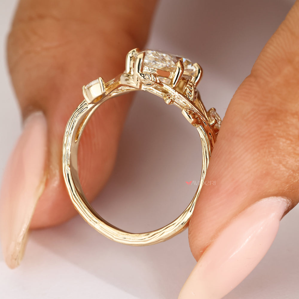 Lab grown marquise diamond ring with pear side stone design

